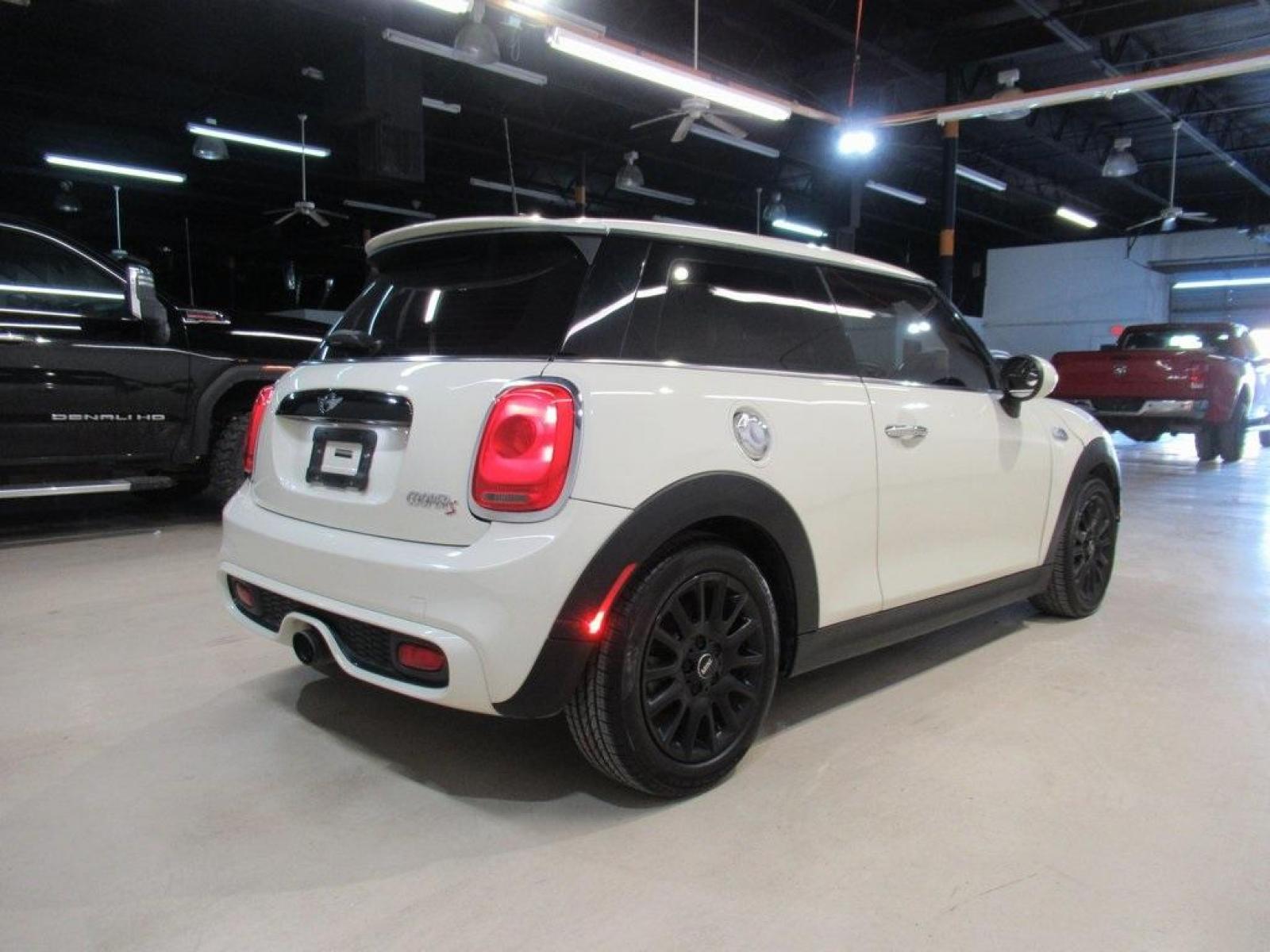 2014 Pepper White /Carbon Black MINI Cooper S Base (WMWXM7C51ET) with an 2.0L 16V TwinPower Turbo engine, Manual transmission, located at 15300 Midway Rd., Addison, 75001, (972) 702-0011, 32.958321, -96.838074 - Photo #2