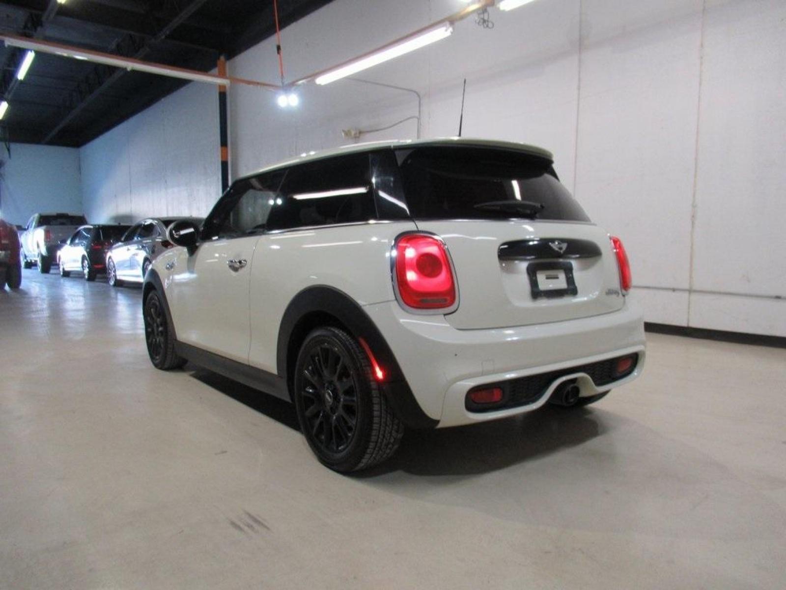 2014 Pepper White /Carbon Black MINI Cooper S Base (WMWXM7C51ET) with an 2.0L 16V TwinPower Turbo engine, Manual transmission, located at 15300 Midway Rd., Addison, 75001, (972) 702-0011, 32.958321, -96.838074 - Photo #3