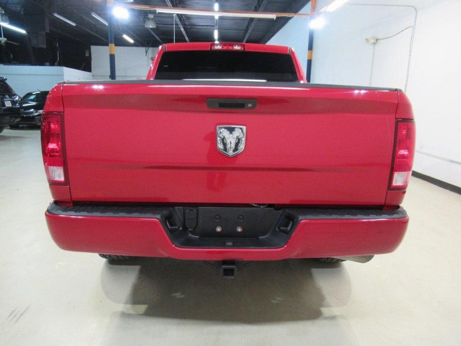 2014 Flame Red Clearcoat /Black Ram 1500 Express (3C6JR6AG9EG) with an 3.6L V6 24V VVT engine, Automatic transmission, located at 15300 Midway Rd., Addison, 75001, (972) 702-0011, 32.958321, -96.838074 - Photo #7
