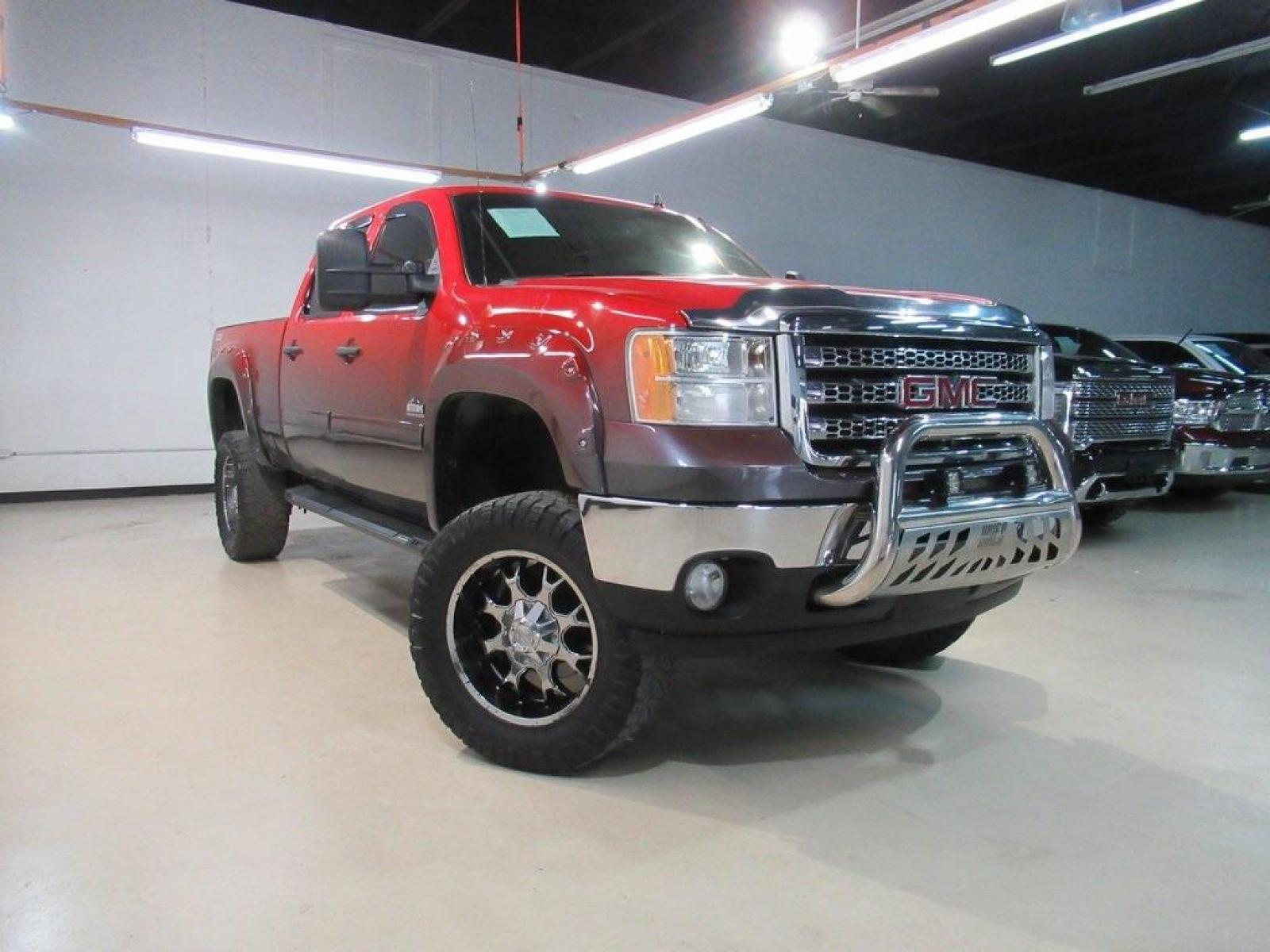 2014 Fire Red /Ebony GMC Sierra 2500HD SLE (1GT120CG0EF) with an Vortec 6.0L V8 SFI Flex Fuel VVT engine, Automatic transmission, located at 15300 Midway Rd., Addison, 75001, (972) 702-0011, 32.958321, -96.838074 - HOME OF THE NO HAGGLE PRICE - WHOLESALE PRICES TO THE PUBLIC!! 4WD, Bluetooth, Hands Free Connectivity, Navigation, Premium Audio, Backup Camera, Sierra 2500HD SLE ROCKY RIDGE PACKAGE, 4D Crew Cab, Vortec 6.0L V8 SFI Flex Fuel VVT, 6-Speed Automatic HD Electronic with Overdrive, 4WD, Fire Red, Ebony - Photo #2