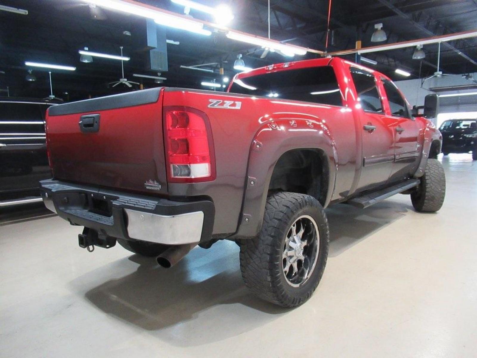 2014 Fire Red /Ebony GMC Sierra 2500HD SLE (1GT120CG0EF) with an Vortec 6.0L V8 SFI Flex Fuel VVT engine, Automatic transmission, located at 15300 Midway Rd., Addison, 75001, (972) 702-0011, 32.958321, -96.838074 - HOME OF THE NO HAGGLE PRICE - WHOLESALE PRICES TO THE PUBLIC!! 4WD, Bluetooth, Hands Free Connectivity, Navigation, Premium Audio, Backup Camera, Sierra 2500HD SLE ROCKY RIDGE PACKAGE, 4D Crew Cab, Vortec 6.0L V8 SFI Flex Fuel VVT, 6-Speed Automatic HD Electronic with Overdrive, 4WD, Fire Red, Ebony - Photo #3