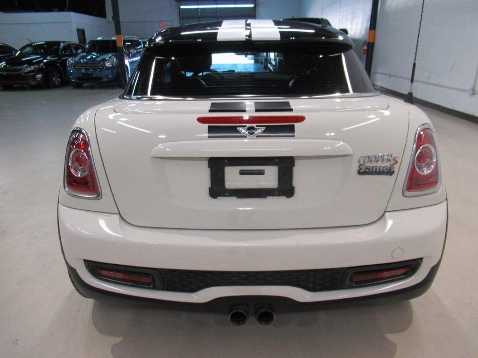 2015 Pepper White /Carbon Black MINI Cooper S Base (WMWSX3C52FT) with an 1.6L I4 DOHC 16V Turbocharged engine, Automatic transmission, located at 15300 Midway Rd., Addison, 75001, (972) 702-0011, 32.958321, -96.838074 - HOME OF THE NO HAGGLE PRICE - WHOLESALE PRICES TO THE PUBLIC!! 2D Coupe, 1.6L I4 DOHC 16V Turbocharged, 6-Speed Automatic Steptronic, FWD, Pepper White, Carbon Black Artificial Leather.<br><br>Pepper White 2015 MINI Cooper S<br><br>25/34 City/Highway MPG<br><br><br>At Midway Auto Group, we strive to - Photo #7